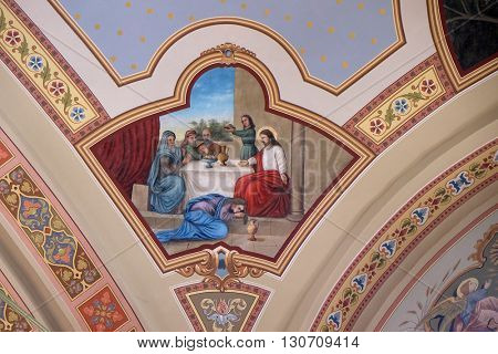 STITAR, CROATIA - AUGUST 27: The supper of Jesus by Simon the Pharisee, fresco in the church of Saint Matthew in Stitar, Croatia on August 27, 2015