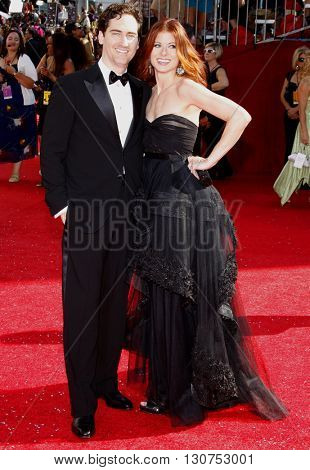 Daniel Zelman and Debra Messing at the 60th Primetime Emmy Awards held at the Nokia Theater in Los Angeles, USA on September 21, 2008.