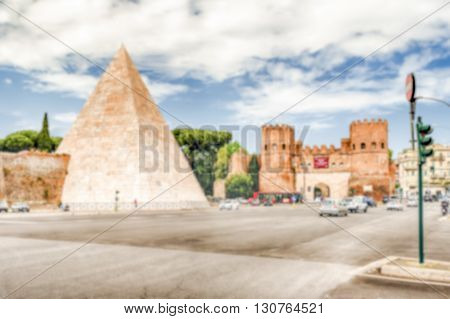 Defocused Background With Pyramid Of Cestius In Rome, Italy