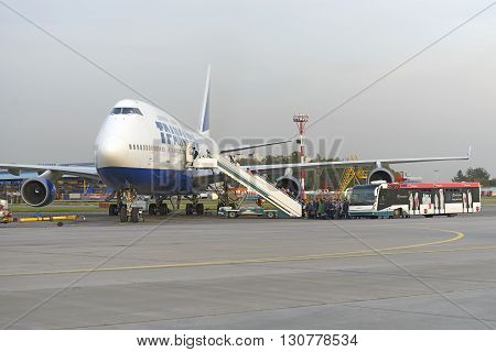 Passengers Board The Aircraft Boeing 747 Transaero Airlines