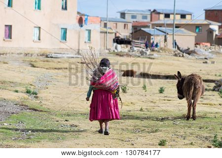 Island of the Sun Bolivia - August 20 2015: Rural life on the Island of the Sun Titicaca Lake Bolivia. About 800 families live on the island. They speak Aymara and Quechua language.