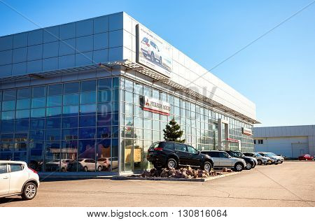 SAMARA RUSSIA - MAY 14 2016: New cars parked up near the office building of official dealer Mitsubishi. Mitsubishi Motors Corporation is a multinational automotive manufacturer