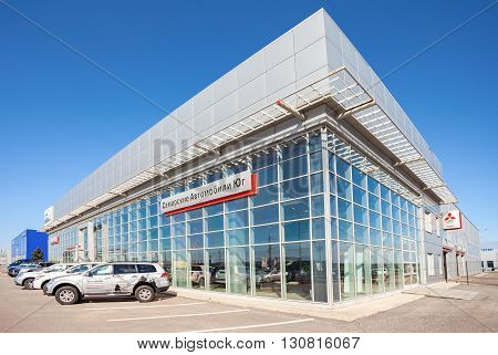 SAMARA RUSSIA - MAY 14 2016: New cars parked up near the office building of official dealer Mitsubishi. Mitsubishi Motors Corporation is a multinational automotive manufacturer