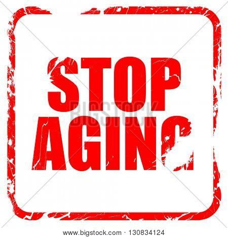 stop aging, red rubber stamp with grunge edges