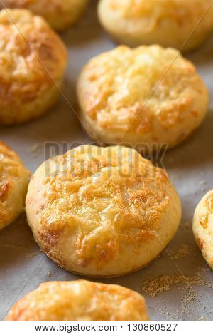Hungarian traditional Cheese Pogacsa savory baked bread-like pastry photographed with natural light (Selective Focus Focus one third into the image)