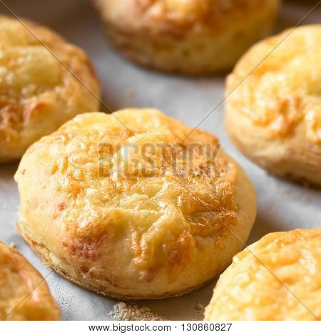 Hungarian traditional Cheese Pogacsa savory baked bread-like pastry photographed with natural light (Selective Focus Focus in the middle of the pogacsa)