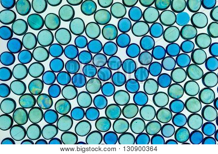 small blue glass hemispheres for a geometric composition and interesting patterns