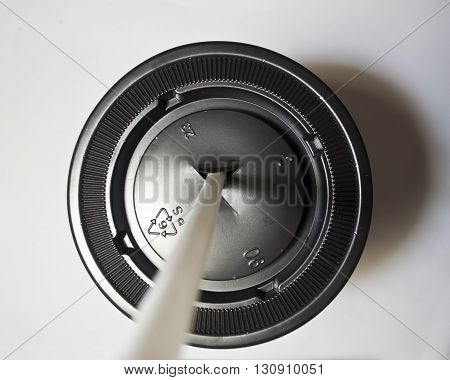 Recycle symbol on Plastic cap of cup
