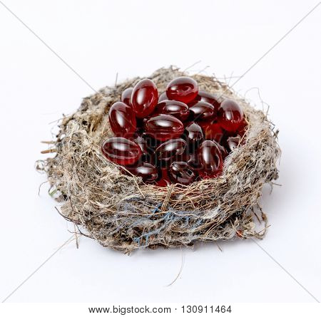 Picture of a Cod liver oil omega 3 gel capsules in sparrow nestC