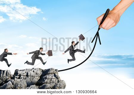 Hand drawing businessman running on arrow and rock on blue sky
