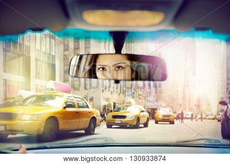 Businesswoman driving into fraffic