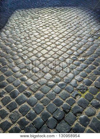 cobblestone pavement in the streets of Rome