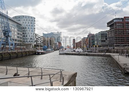 HAMBURG, GERMANY - MAY 16, 2016: Buildings at Sandtorhafen located on the Elbe river islands