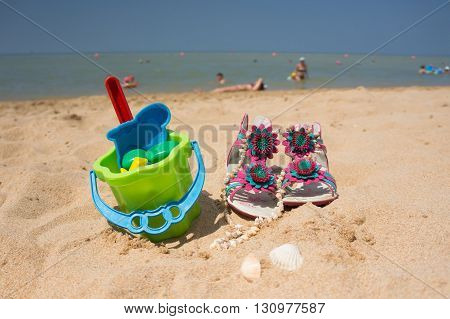 Toys for children sandboxes against the sea