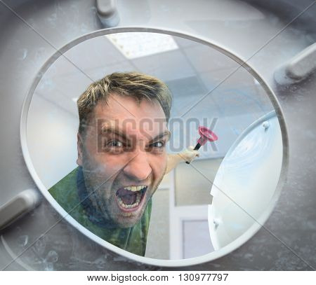 Man with cup plunger