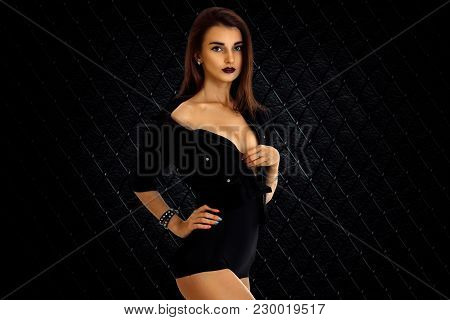 Charming Young Girl Take Off A Jacket Without Bra Under It And Looking At The Camera Isolated On Whi