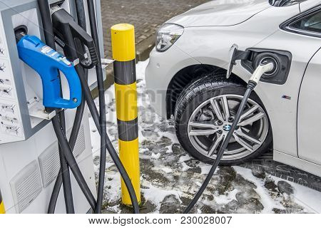 Limburg , Germany - February 11 2018 : Filling Station Charging The Car In The Winter