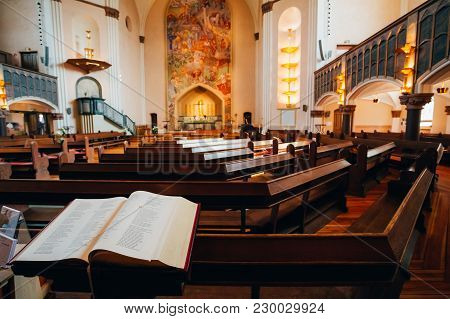 Stockholm, Sweden - July 29, 2014: Open Bible Book In Sofia Kyrka Church. Sofia Church Named After T