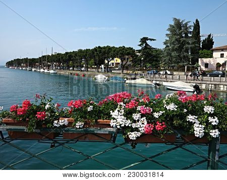 A Small Provincial Town On The Coast Of The Lake. Garda With Enchanting Views And A Special Charm.