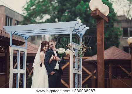 Happy Bride And Groom After Wedding Ceremony