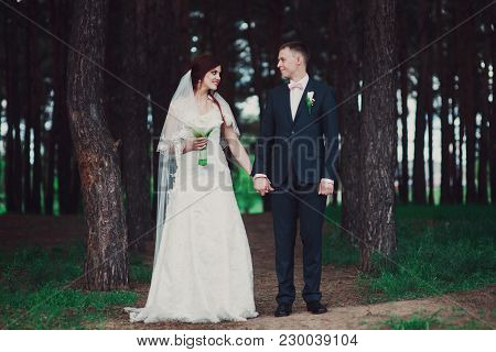 Wedding Couple In The Forest