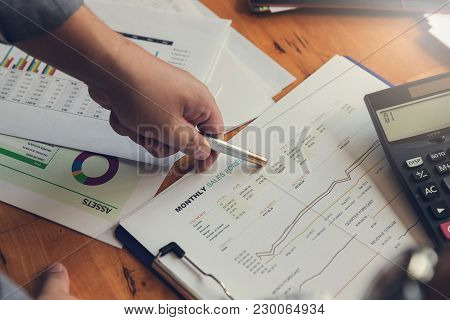 Business And Finance Concept Of Office Working, Businessman Discussing Sale Analysis Chart