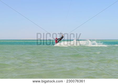 Kiteboarding Man Sport Extrime  On The Sea Photo