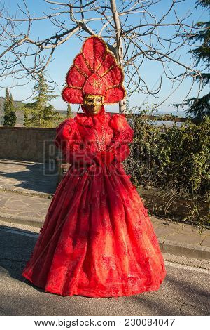 Portrait Of Woman With Red Costume Of Carnival
