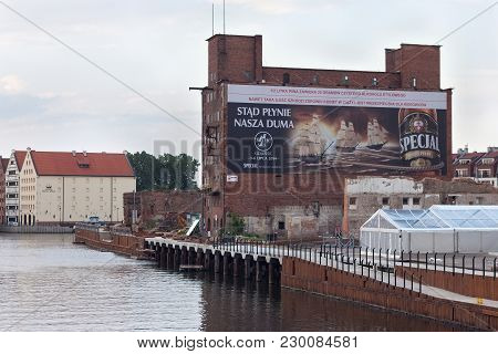 Gdansk, Poland - June 07, 2014: Old Abandoned Large Barn From Red Brick Known As 