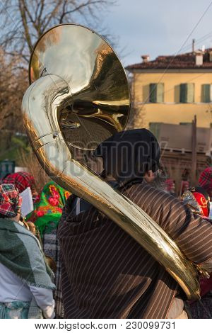 Outdoor Performer In Band With Brass Sousaphone.