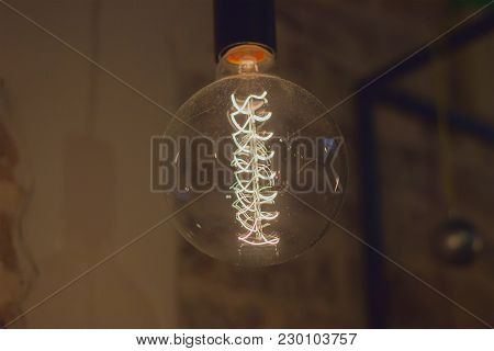 Set Of Light Bulbs Retro Style At Brown Background