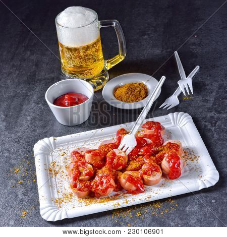 A Fresh And Tasty Curry Bockwurst With Beer