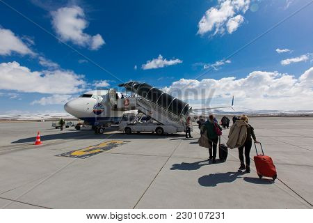 Kars, Turkey - March 07, 2017: People are entering to Sunexpress flight to Izmir on March 07, 2017 i