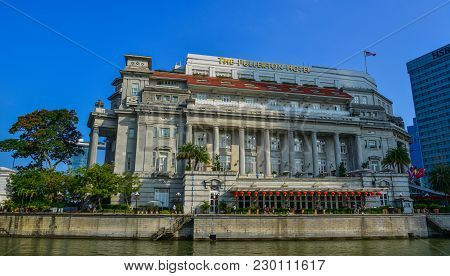 Singapore - Feb 9, 2018. Famous Fullerton Hotel With Riverscene In Singapore. Singapore Is Global Fi