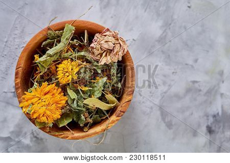 Spa Still Life With Flowers In Wooden Bowl On Light Textured Background, Top View, Close-up, Selecti