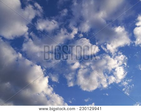 Blue Sky And White Clouds. Background Heaven.