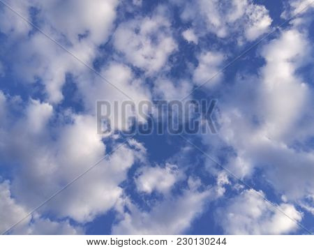 Blue Sky And White Clouds. Background Heaven.