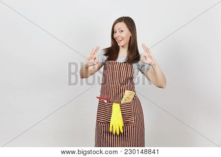 Young Smiling Housewife In Striped Apron With Cleaning Rag, Squeegee Yellow Gloves In Pocket Isolate
