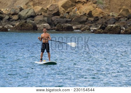 Paddle Barding In The Pacific