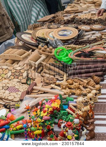 Handmade Wooden Goods On The Fair Displayed In The Shop-window