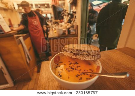 Munich, Germany - November 16, 2017: Tasty Soup And Bread In A Busy Street-food Cafe With Local Menu