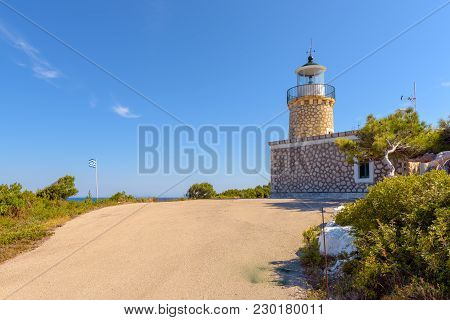 Lighthouse Of Keri Located At The Marathias Cape On Zakynthos Island In Greece. The Height Of The To