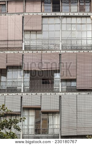 Barcelona,spain-september 6,2015: Facade Building, Balconies, Sliding Curtains In Raval Quarter Of B
