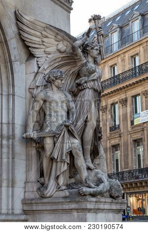 Architectural details of Opera National de Paris: Dance Facade sculpture by Carpeaux. Grand Opera Garnier Palace is famous neo-baroque building in Paris, France - UNESCO World Heritage Site