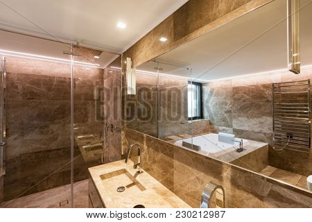 Luxurious marble bathroom with hydromassage for two people. Nobody inside