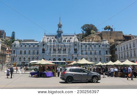 Valparaiso, Chile - January 2,2018: The Plaza Sotomayor, In Valparaiso. In The Background, In Blue, 