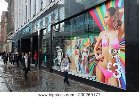 Manchester, Uk - April 21, 2013: People Visit Primark Store In Manchester, Uk. Primark Has 257 Fashi