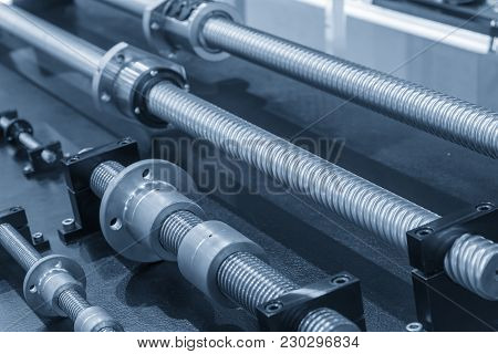 The Lead Screw Spare  Part Of Cnc Machine In The Light Blue Scene.