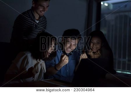 Succsessful Businesspeople Are Working With Laptop  Overtime Late At Nitgh. They Are Using Laptop To