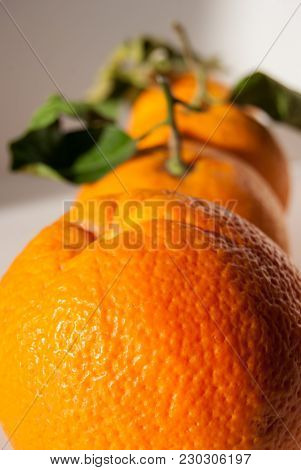 3 Oranges In Sequence One Behind The Other